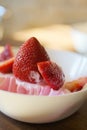 Close up of home made strawberry ice cream garnished with fresh Royalty Free Stock Photo