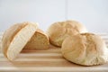 Close-up of homemade bread on wooden table. Rising price of basic needs Royalty Free Stock Photo