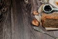 Close up Homemade delicious freshly baked classic sweet banana bread sliced with blueberry/strawberry jam and butter knife on a wo Royalty Free Stock Photo