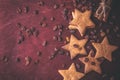 Close up of homemade ginger cookies, cinnamon with raisins on a red wooden table Royalty Free Stock Photo