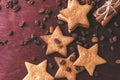 Close up of homemade ginger cookies, cinnamon with raisins on a red wooden table Royalty Free Stock Photo