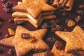 Close up of homemade ginger cookies in the shape of a star with raisins Royalty Free Stock Photo