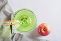 close up of homemade green apple martini cocktail with apple pieces in glasses top view Royalty Free Stock Photo