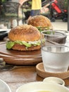 Close-up of homemade hamburgers on wooden table