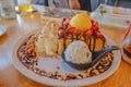 Close up Honey Toast Top up with Vanilla Ice cream chocolate and stawberry eat with Cookie and cream ice crean