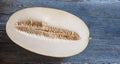 Close up honeydew melon on wood table Royalty Free Stock Photo