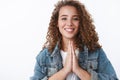 Close-up hopeful friendly-looking relaxed attractive plump girl practicing meditation breathing smiling press palms