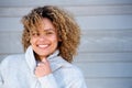 Close up beautiful african american woman smiling in warm sweater Royalty Free Stock Photo