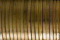 Close up on a horizontal stack of gold coins Royalty Free Stock Photo