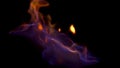 Close up horizontal view for blue and red burning fire, isolated on black background. Beautiful, hypnotic, mystical, red Royalty Free Stock Photo