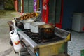 Close up of hornado roasted pork with a corn, over an industrial kitchen in local, in an ecuadorian traditional typical andean foo