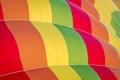 Close-up of hot air balloon. Color backgrounds. Yellow, orange, red and green balloon Royalty Free Stock Photo