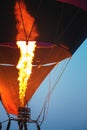 Close-up of hot air balloons with fire blue sky background Royalty Free Stock Photo