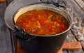 Close-up of hot beef hunting goulash or bograch soup with paprika, small egg pasta, vegetables and spices in a pot Royalty Free Stock Photo