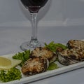 Clams Casino with a Glass of Red Wine Royalty Free Stock Photo