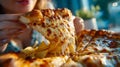 Close-up of a hot cheesy pizza slice being pulled apart with melting cheese strands Royalty Free Stock Photo