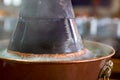 Close-up of a hot old Beijing shabu-shabu copper pot Royalty Free Stock Photo