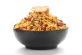 Close-Up of Hot spicy Nav Ratan snacks in a black Ceramic bowl, made with red chili, peanuts. Indian spicy snacks Namkeen Royalty Free Stock Photo