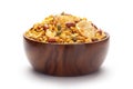 Close-Up of Hot spicy Nav Ratan snacks In hand-made handcrafted wooden bowl, made with red chili, peanuts. Indian spicy snacks Royalty Free Stock Photo