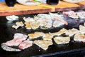 Closeup of Hot Traditional pork tepanyaki on hot pan in Japan