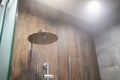 Close up of hot Water flowing from shower in the bathroom interior Royalty Free Stock Photo