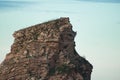 Close up of huge cliff rock eroded texture in sunset sky, hendaye