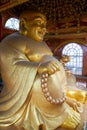 Close-up of a huge statue of Maitreya Buddha