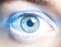 Close-up of human eye with subtle digital HUD reflection, iris scanning technology for cybersecurity and biometric identity Royalty Free Stock Photo