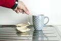 Hand holding a tea bag Royalty Free Stock Photo