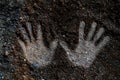 Close up human hand print on the soil ground g Royalty Free Stock Photo