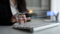 Close-up of Human Hand Tapping on Keyboard with Prompts and Generate Button in Modern Office Environment, Concept of Royalty Free Stock Photo