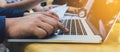 Close up human hand typing keyboard laptop. Royalty Free Stock Photo