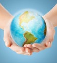 Close up of human hands with earth globe Royalty Free Stock Photo