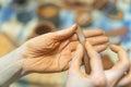 Close up of human hands making a clay pottery. Pottery teaching class. Potter makes dishes from clay, ceramics