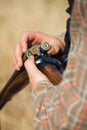 Close-up of a hunter loading his shotgun Royalty Free Stock Photo