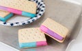 Close up of ice cream biscuits with coloured ice cream. Royalty Free Stock Photo