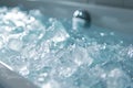 Close up of ice cubes in a cold ice bath plunge pool