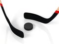 Close up of an ice hockey stick and puck Royalty Free Stock Photo