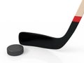 Close up of an ice hockey stick and puck