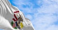 Close-up of the Illinois state flag waving in the wind on a clear day