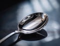Close-Up Illustration of a Polished Silver Spoon with Elegant Design Royalty Free Stock Photo