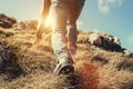 Close up imade climber legs make a last steps before peak Royalty Free Stock Photo