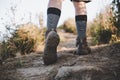 Climber legs make a last steps before peak Royalty Free Stock Photo