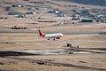 Leh, Jammu and Kashmir, India - June 26, 2011 : Air india airbus touches down at Leh airport Royalty Free Stock Photo