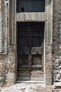 Close-up image of ancient closed doors. Old Italy. Background. Lock. vintage, retro. vertical photo