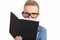 Close up Attractive caucasian schoolboy wearing eyeglasses holding a notebook pen in hands isolated white background Royalty Free Stock Photo