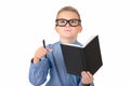 Close up Attractive caucasian schoolboy wearing eyeglasses holding a notebook pen in hands isolated white background Royalty Free Stock Photo