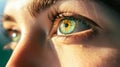 Close-up image of a beautiful female eye with a green iris. Open eye, macro photography. Macro of Human Eye. Royalty Free Stock Photo