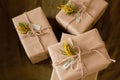 Close-up image of beautiful gift box decorated with yellow flowers on a dark background Royalty Free Stock Photo