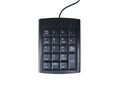 A close-up image of a black wired numeric keypad featuring number keys. Royalty Free Stock Photo